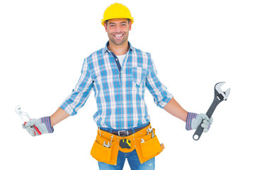 Poster - Portrait of handyman holding hand tools