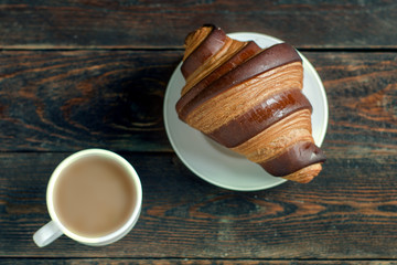 croissant with coffee cup, breakfast concept