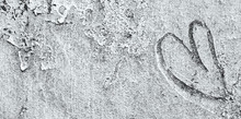 Abstract Symbol Of Heart Scrawled On Light Silver Cement Wall.