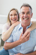 © WavebreakmediaMicro - Portrait of a loving couple in the living room