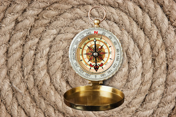 Wall Mural - compass on old twisted rope