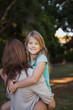 © WavebreakmediaMicro - Mother holding her daughter in arms