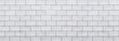 © torsakarin - Panorama of cement block wall background and pattern
