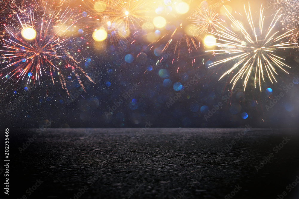abstract black and gold glitter background with fireworks and asphalt floor or stage. christmas eve, 4th of july holiday concept. - obrazy, fototapety, plakaty 