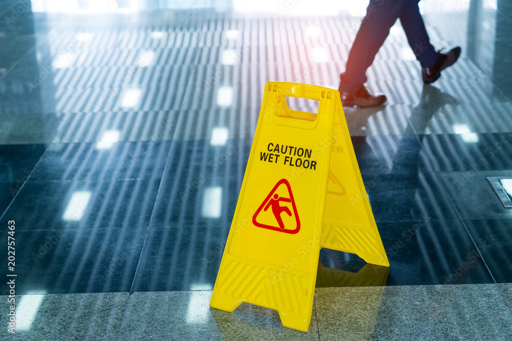"Caution wet floor" sign - obrazy, fototapety, plakaty 
