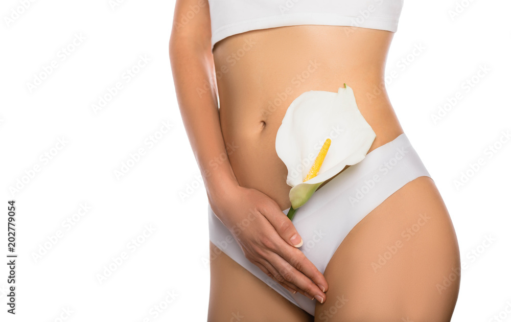 woman dressed in white panties, holding a white flower in her hands, close-up. female health, reproductive, gynecology isolated on white - obrazy, fototapety, plakaty 