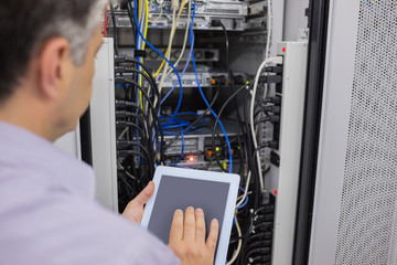 Aufkleber - Man doing server maintenance with tablet pc