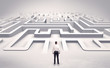 © ra2 studio - Businessman getting ready to enter a 3D flat labyrinth concept