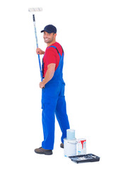 Poster - Handyman painting with roller on white background