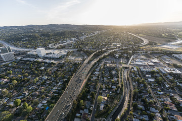 Wall Mural - Late afternoon aerial view of Ventura 101 Freeway in the San Fernando Valley area of Los Angeles, California.