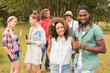 © WavebreakmediaMicro - Happy friends in the park having barbecue
