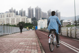 Fototapeta  - Girl Riding Bike