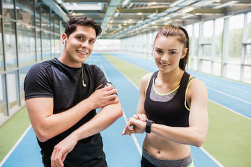 Wall Mural - Fit couple on the indoor track