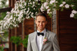 © Wedding photography - Wedding. Portrait of elegant groom with white teeth smile