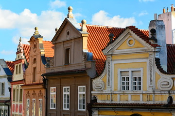 Wall Mural - Prague's  buildings, facade, roofs in a sunny day.