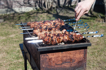 Cooking shashlik on the brazier