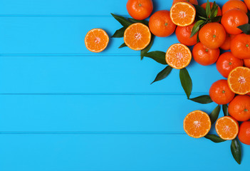 Wall Mural - Orange on wooden background.