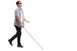 Blind young man with a cane walking