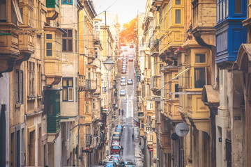 Wall Mural - Old Narrow Street With Traditional Closed Wooden Balconies In Valletta city, Malta