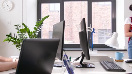 Wall Mural - business, technology and people concept - woman showing user interface design on flip chart to creat