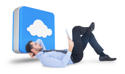 Wall Mural - Businessman lying on floor using tablet  against cloud computing tile