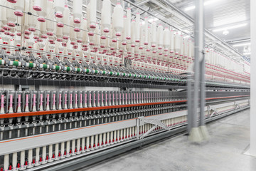 Canvas Print - Machinery and equipment in the workshop for the production of thread. interior of industrial textile factory