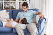 © WavebreakmediaMicro - Young woman resting on mans lap on couch
