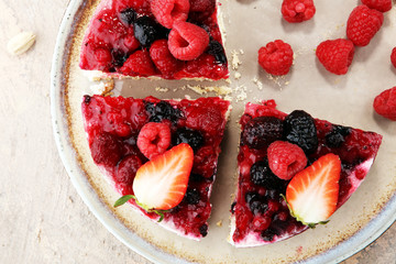 raspberry cake and many fresh raspberries