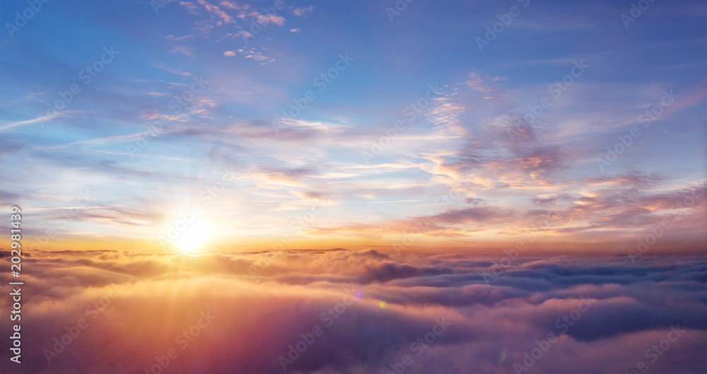Beautiful sunset sky above clouds - obrazy, fototapety, plakaty 