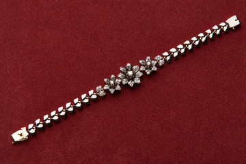 Diamond Women's Wristband. Beautiful luxury bracelet jewellery with gemstone diamonds, close-up. Selective focus