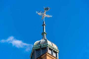 Sticker - Vintage weatherclock on top of old building