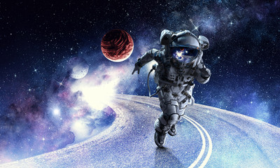 Wall Mural - Running spaceman and galaxy. Mixed media
