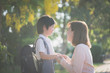 © lalalululala - Asian mother  saying goodbye to her son as he leave for School,back to school concept