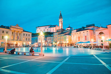 Wall Mural - beautiful city scenery in the central square with the old clock tower in porec, the tourist center o