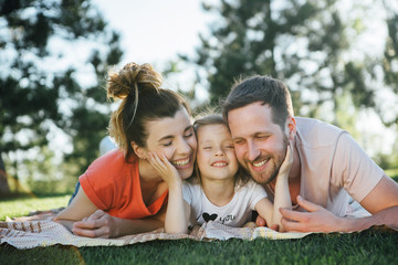 Wall Mural - Family with dauhter  rest in park.