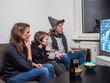 © arianarama - German family is watching football world cup soccer on tv
