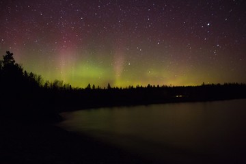 northern lights and aurora over lake superior on the north shore of lake superior in minnesota