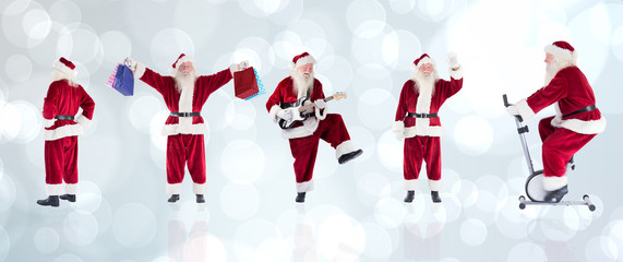 Wall Mural - Composite image of different santas against light glowing dots design pattern