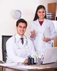 Two doctors in private clinic .