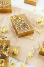 Brown And Yellow Handmade Soap Bars With Honey And Herbs