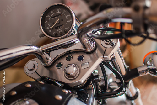 Fotografia, Obraz Closeup of chopper dashboard and gauges. Shiny chrome details