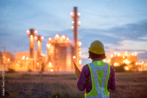 Fotografía Engineers working in power stations./ Blur focus