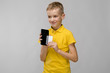 © Ivan Traimak - Cute boy with telephone