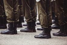 Military Men In Green Dress Uniform Stand At Attention