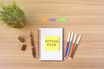 Wall Mural - Action Plan text on sticky note, flat lay business office desk.