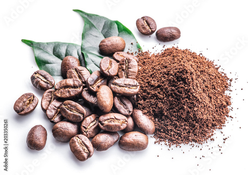 Cuadros en Lienzo Roasted coffee beans ground coffee on white background.