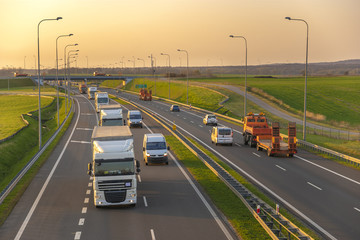 Wall Mural - evening traffic of cars on the Polish expressway