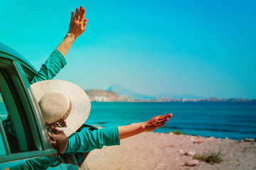 happy girl enjoy travel by car at beach