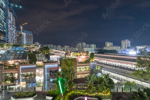 Office and residential buildings in Singapore at evening Poster