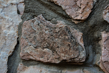 Close up of natural stone wall. Stone wall texture 